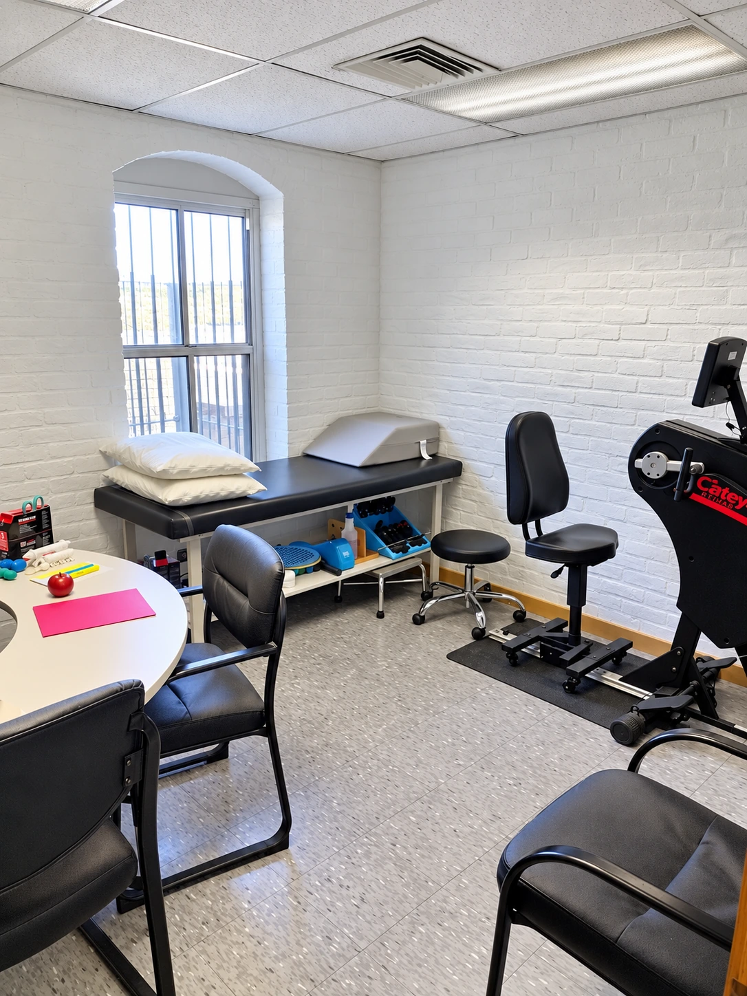 Original Apollo treatment room with therapy table and exercise equipment