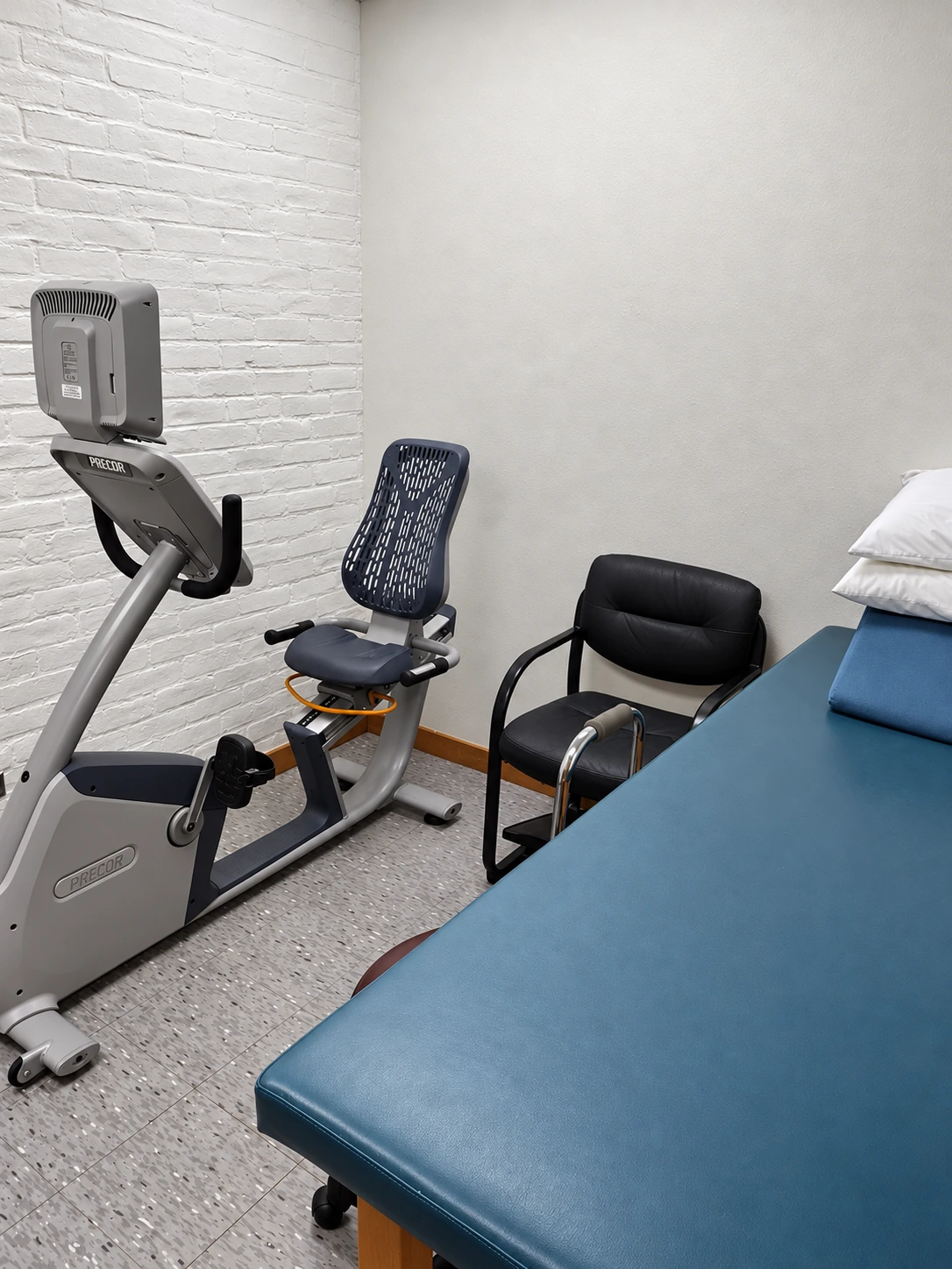 Original Apollo treatment space with a recumbent exercise bike